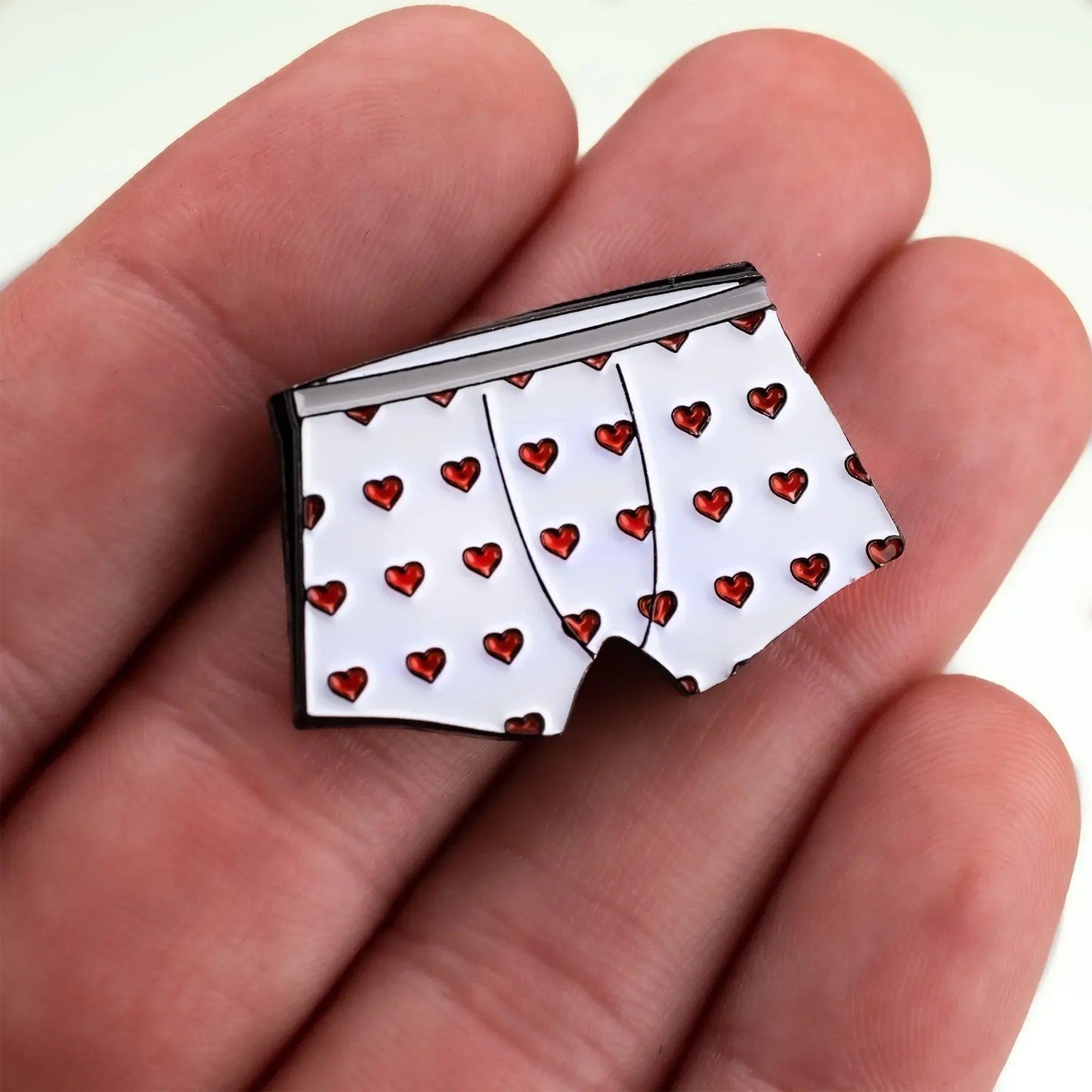 BallMarker_Boxers_InHand - GOLF LEAGUE