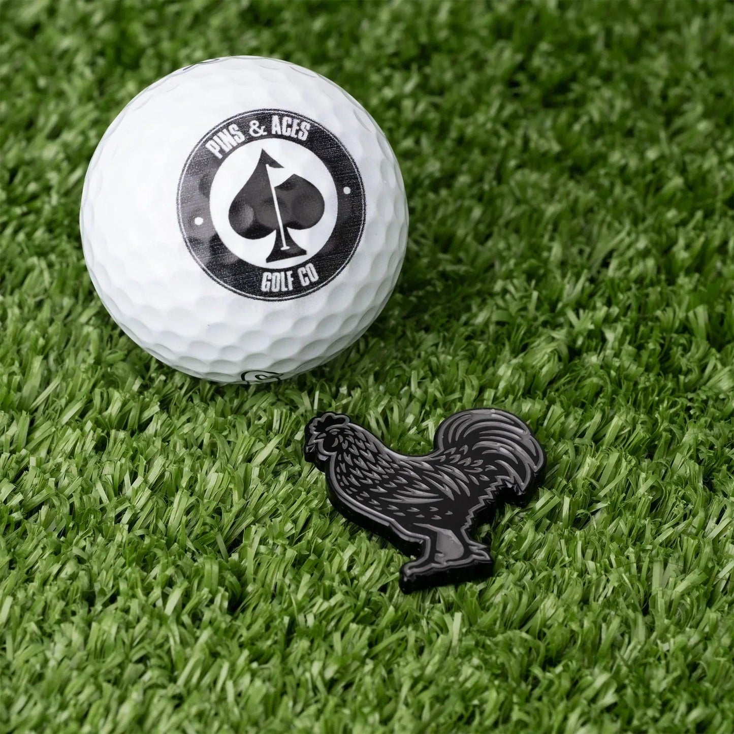 BlackCOck_BallMarker_NextToBall_RolloverImage - GOLF LEAGUE