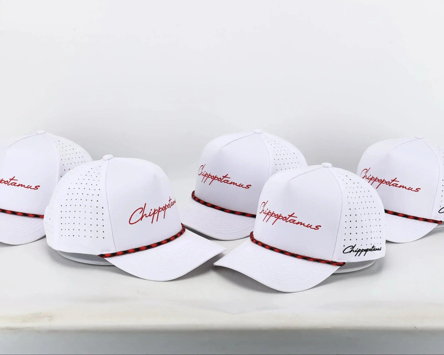 WhitehatwithredropeChippopotamus_e1f505af-d3ba-4ede-9a7e-7712f9de632e - GOLF LEAGUE