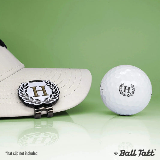 h-monogram-ball-tatt-black-gold-on-cap - GOLF LEAGUE