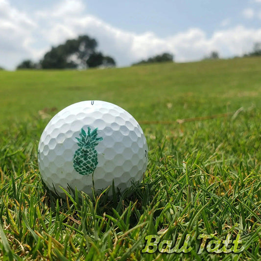 pineapple-ball-tatt-in-grass - GOLF LEAGUE
