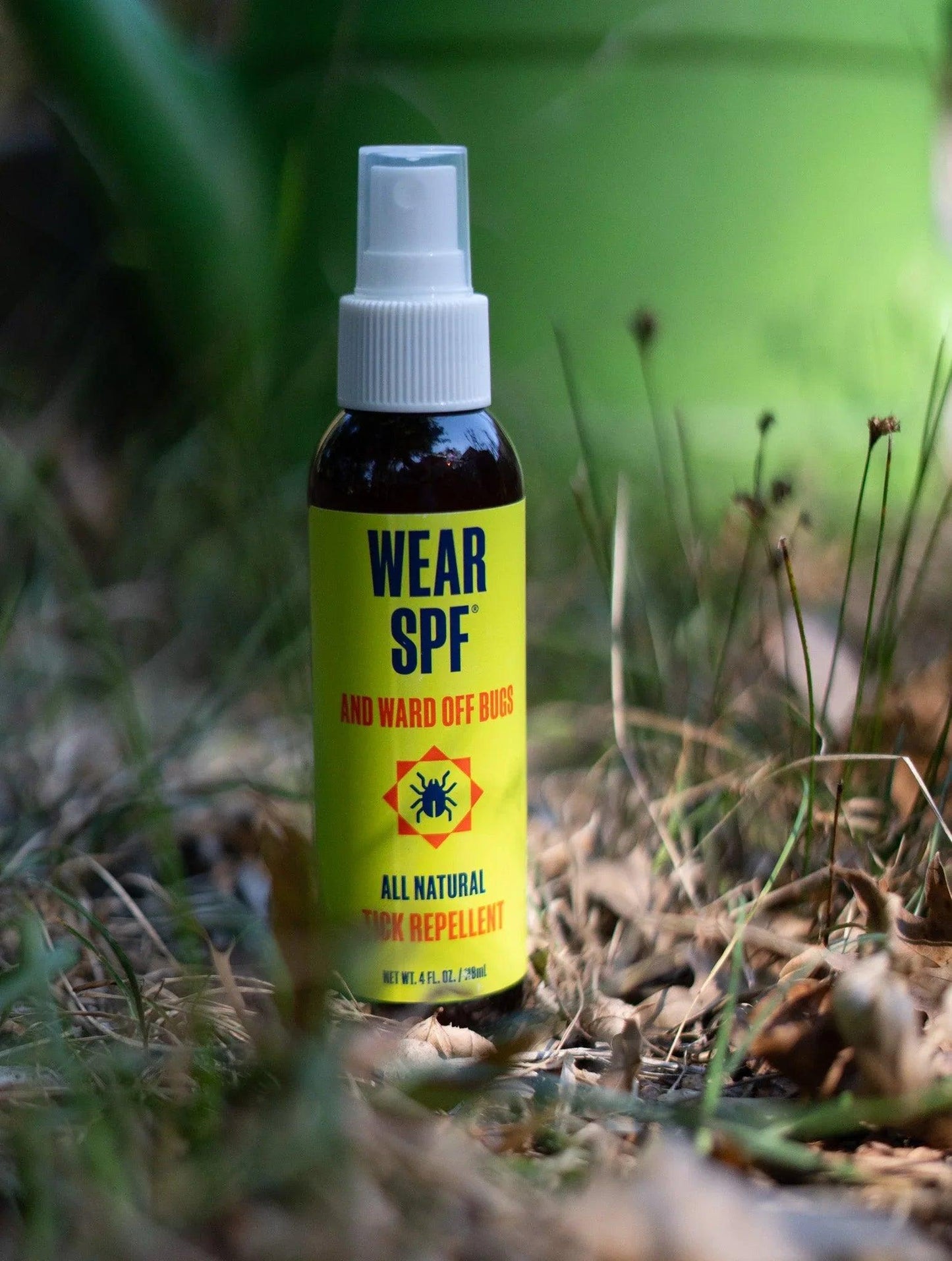 WearSPF-Tick-Spray-In-Grass - GOLF LEAGUE